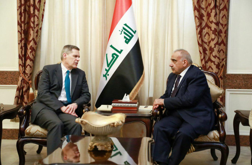 Iraqi Prime Minister Adel Abdul Mahdi meets with U.S. Ambassador to Iraq Matthew Tueller in Baghdad, Iraq January 6, 2020 (photo credit: REUTERS)