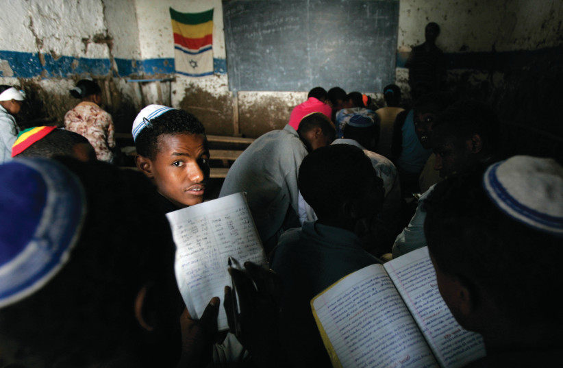 ETHIOPIAN CHILDREN attend Jewish studies class while awaiting immigration to Israel, in Gondar. (photo credit: ELIANA APONTE/REUTERS)