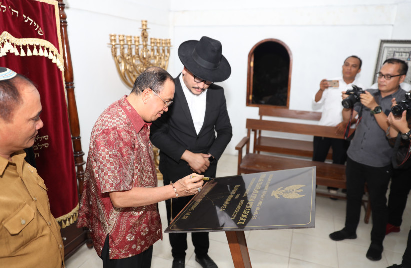 Official ceremony inaugurating the Shaar HaShamayim Synagogue in Tondano, Indonesia, at the presence of the Minahasa Regency local authorities in December 2019. (photo credit: COURTESY OF YAAKOV BARUCH)