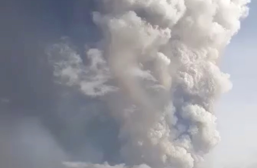 A view of the Taal volcano eruption seen from Tagaytay, Philippines January 12, 2020 in this still image taken from social media video. (photo credit: JON PATRICK LAURENCE YEN VIA REUTERS)
