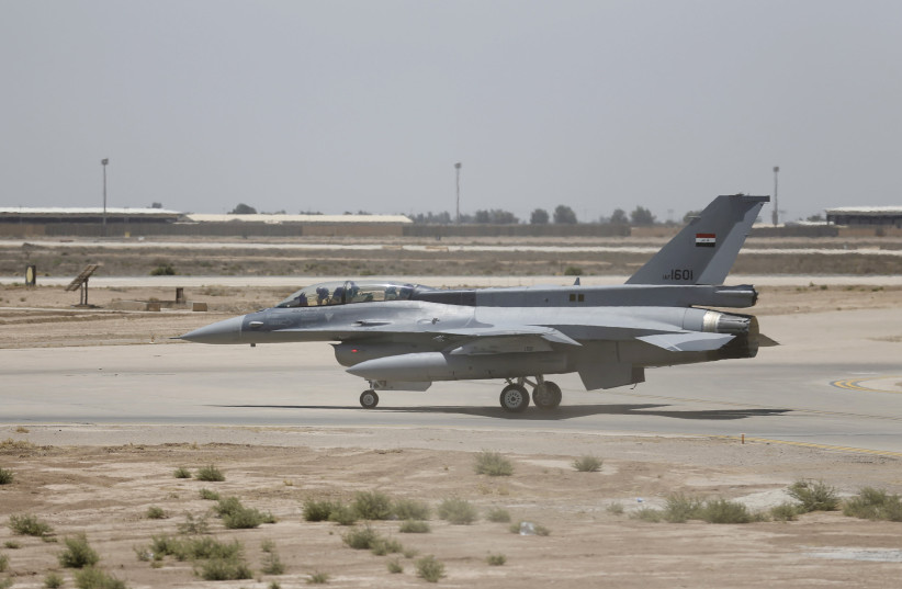 A U.S. F-16 fighter jet is seen on the tarmac if a military base in Balad, Iraq, July 20, 2015 (photo credit: REUTERS/THAIER AL-SUDANI)