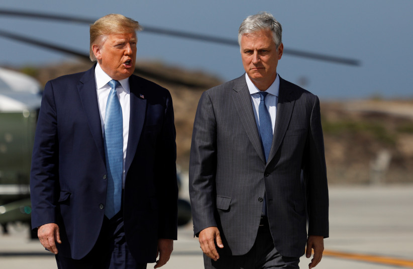 US President Donald Trump walks with U.S. hostage negotiator Robert O'Brien after he named O'Brien as his fourth White House national security adviser at Los Angeles International Airport in Los Angeles, California, US, September 18, 2019 (photo credit: REUTERS/TOM BRENNER)
