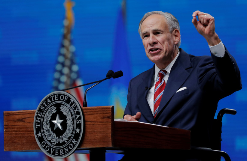 Texas Governor Greg Abbott speaks at the annual National Rifle Association (NRA) convention in Dallas, Texas, U.S., May 4, 2018.  (photo credit: LUCAS JACKSON/REUTERS)