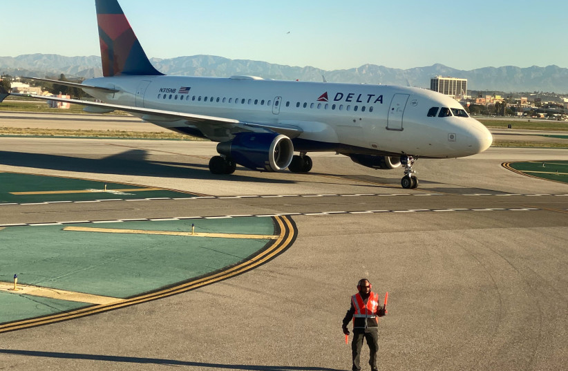 Delta Air Lines Airbus A319 plane on the tarmac at LAX in Los Angeles (photo credit: REUTERS/LUCY NICHOLSON)
