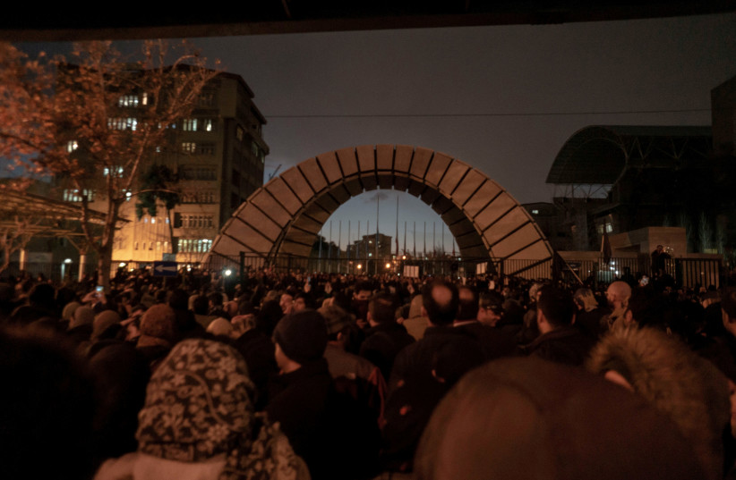 Protesters demonstrate in Tehran, Iran January 11, 2020 (photo credit: SOCIAL MEDIA/REUTERS)