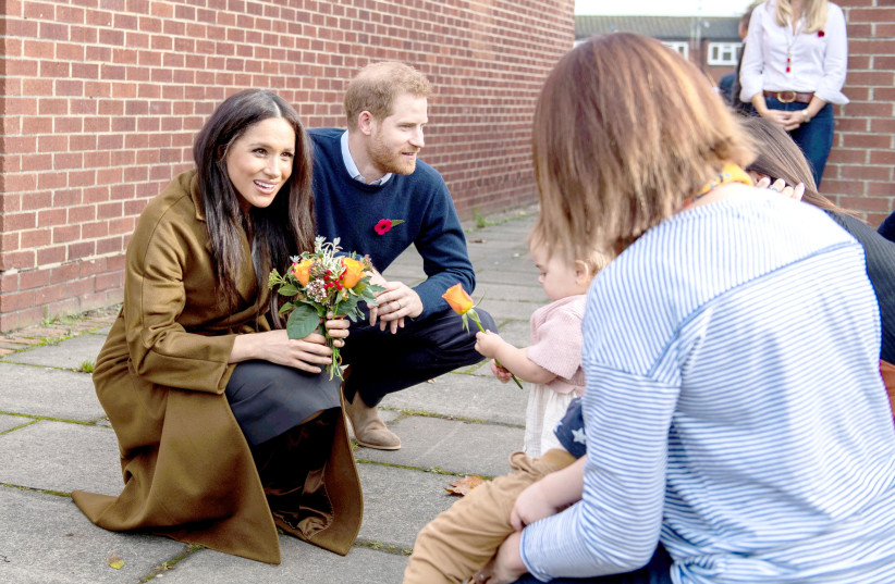 MEGHAN, DUCHESS of Sussex, and Prince Harry attend a coffee morning with families of deployed army personnel, in Windsor on November 6, 2019 (photo credit: REUTERS)