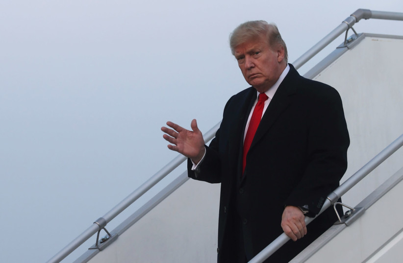U.S. President Donald Trump arrives aboard Air Force One en route to the Word Economic Forum in Davos, at Zurich International Airport in Zurich, Switzerland January 21, 2020. (photo credit: REUTERS/JONATHAN ERNST)