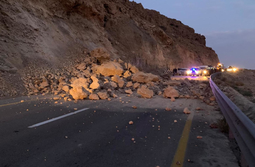 Boulders block the road near the end of the descent to the Dead Sea. (photo credit: ISRAEL POLICE)