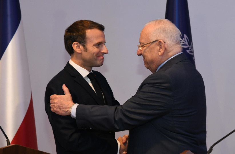 Israeli President Rivlin meets with President Macron of France ahead of the Fifth World Holocaust Forum, January 22, 2020 (credit: HAIM ZACH/GPO)