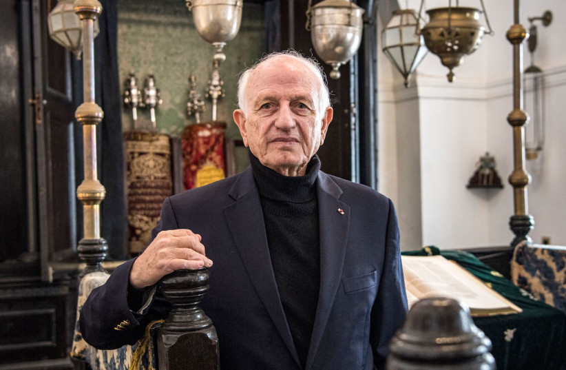 Andre Azoulay, adviser to the Moroccan king, poses for a picture at the Bayt Dakira Jewish museum in Essaouira, Morocco, Dec. 14, 2019 (photo credit: FADEL SENNA/AFP VIA GETTY IMAGES/JTA)