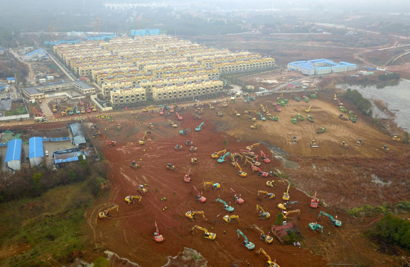 An aerial view shows the construction site of a new hospital dedicated to treating patients with coronavirus, in Wuhan (photo credit: REUTERS)
