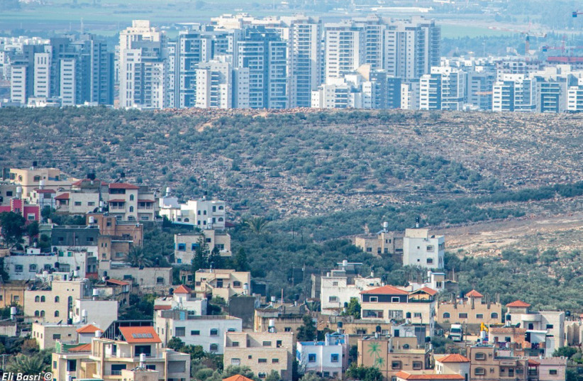 A view towards the dense, chaotic skyline of Gush Dan (photo credit: ELI BASRI)