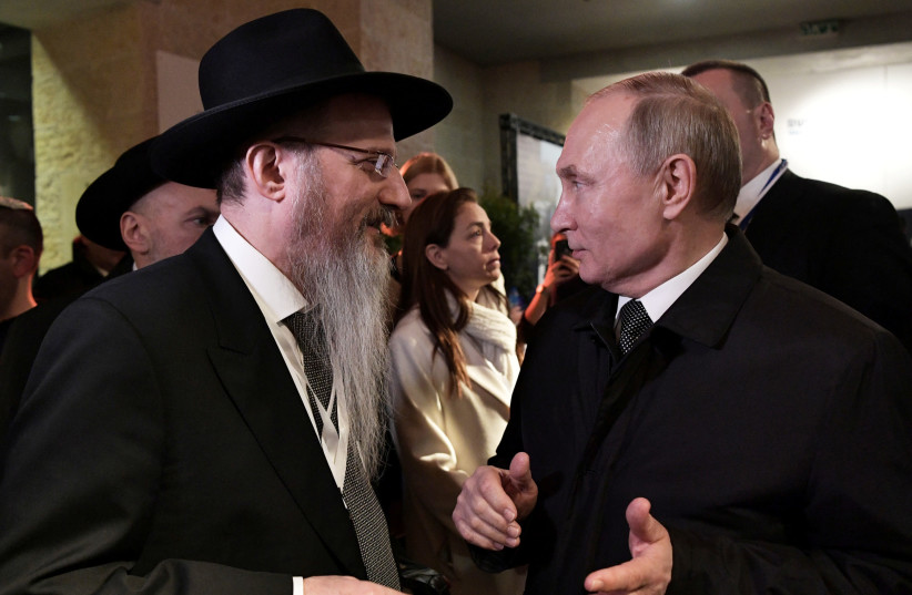 Russian President Vladimir Putin speaks with Chief Rabbi of Russia Berel Lazar during the World Holocaust Forum in Jerusalem, January 23, 2020. (credit: SPUTNIK/ALEXEI NIKOLSKY/KREMLIN VIA REUTERS)