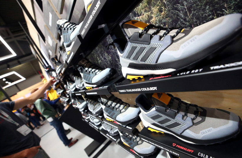 Trail running shoes are seen during the ISPO trade fair for sports equipment and fashion in Munich (credit: REUTERS)