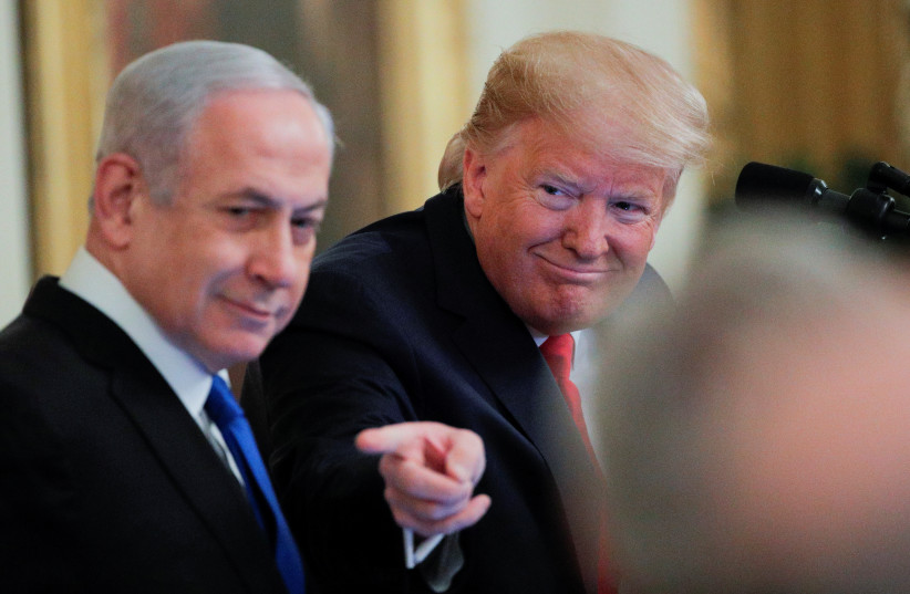 U.S. President Trump and Israel's Prime Minister Netanyahu discuss Middle East peace proposal at White House in Washington (photo credit: BRENDAN MCDERMID/REUTERS)
