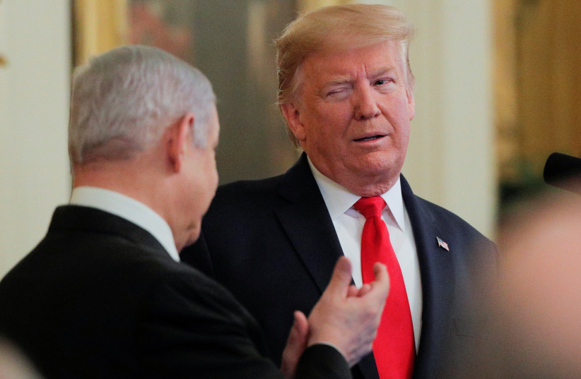 U.S. President Trump and Israel's Prime Minister Netanyahu discuss Middle East peace proposal at White House in Washington (photo credit: BRENDAN MCDERMID/REUTERS)
