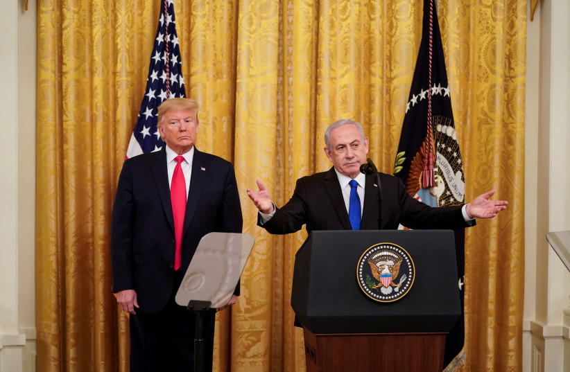 U.S. President Donald Trump and Israel's Prime Minister Benjamin Netanyahu deliver joint remarks on a Middle East peace plan proposal in the East Room of the White House in Washington, U.S., January 28, 2020 (photo credit: REUTERS/JOSHUA ROBERTS)