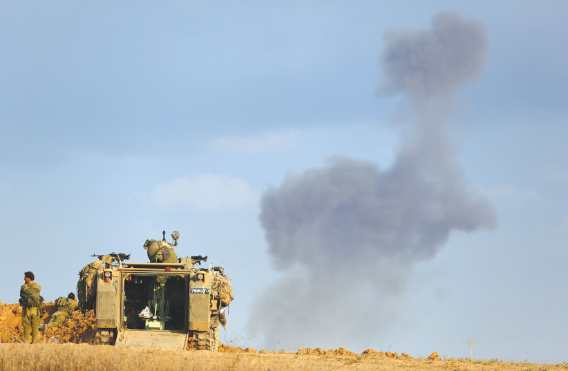 AN ISRAELI tank on the border of Gaza.  (photo credit: REUTERS)