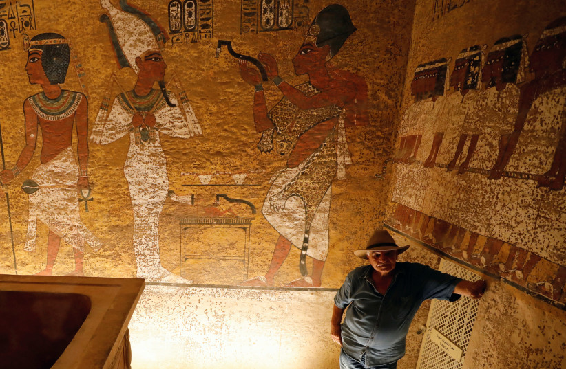 Former Tourism Minister Zahi Hawass, explaining paintings on the newly renovated tomb wall of boy pharaoh King Tutankhamun in the Valley of the Kings in Luxor (credit: REUTERS)