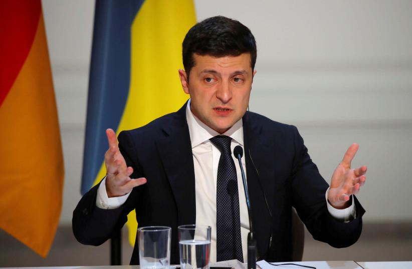 Ukraine's President Volodymyr Zelenskiy speaks during a joint news conference after a Normandy-format summit in Paris, France December 10, 2019. (photo credit: REUTERS)