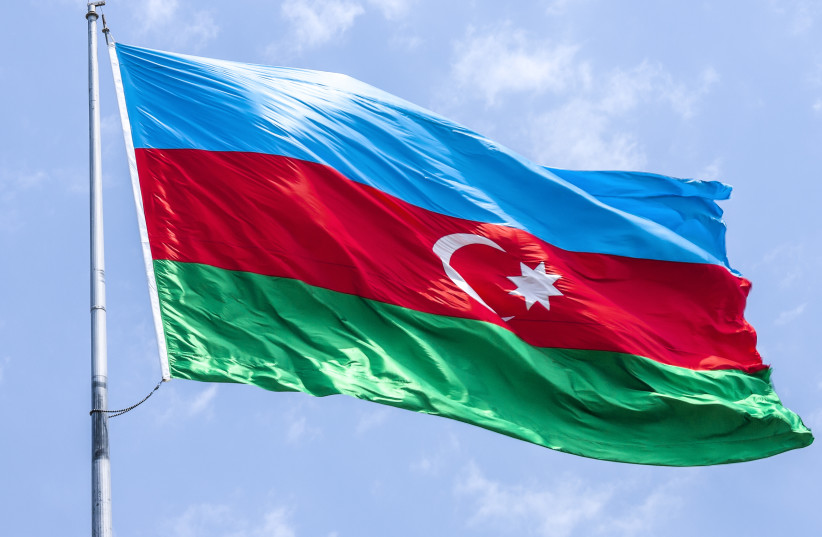 The national flag of Azerbeijan (photo credit: Wikimedia Commons)