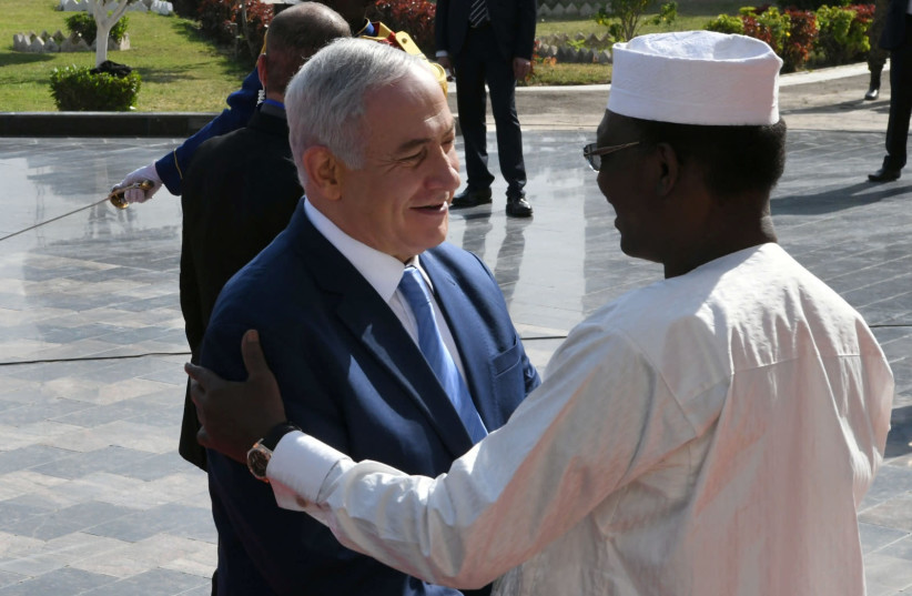Israeli Prime Minister Benjamin Netanyahu is greeted by Chad's President Idriss Deby upon his arrival in N'Djamena, Chad January 20, 2019 (credit: KOBI GIDEON/GOVERNMENT PRESS OFFICE/HANDOUT VIA REUTERS)