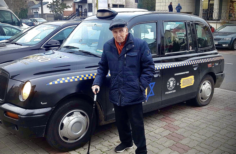 100 year old Righteous Among The Nations Jozef Walaszczyk standing In front of the taxi (photo credit: FROM THE DEPTHS)