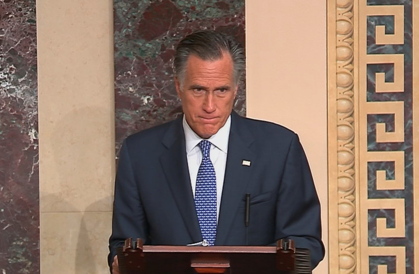 US Senator Mitt Romney announces his intention to vote to convict US president Donald Trump for abuse of power during Senate debate ahead of the resumption and final vote in the Trump impeachment trial in this frame grab from video shot in the Senate Chamber at the US Capitol in Washington, February (photo credit: REUTERS/US SENATE TV/HANDOUT VIA REUTERS)