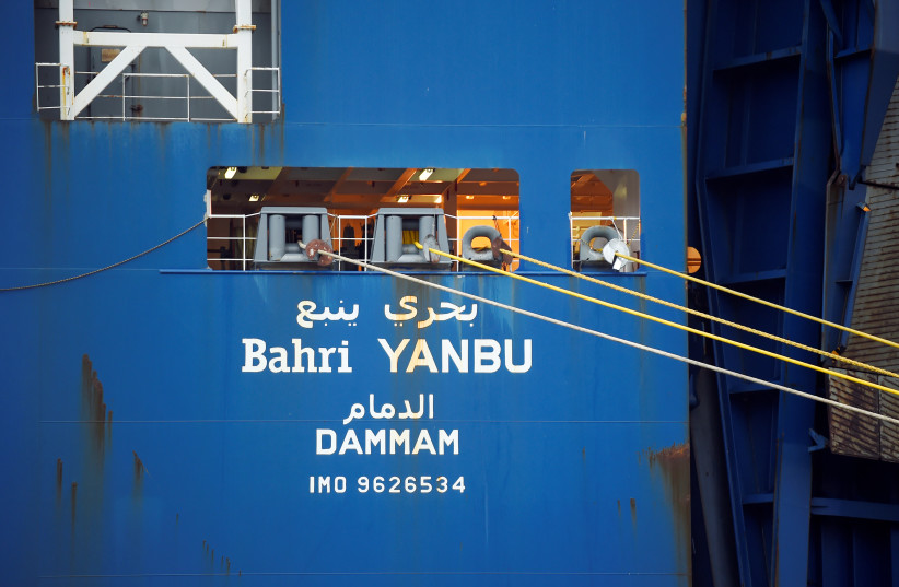 Saudi cargo ship Bahri Yanbu, that was prevented by French rights group ACAT from loading a weapons cargo at the French port of Le Havre due to concerns they might be used against civilians in Yemen, is seen at the Port of Genoa, Italy May 20, 2019 (photo credit: REUTERS)