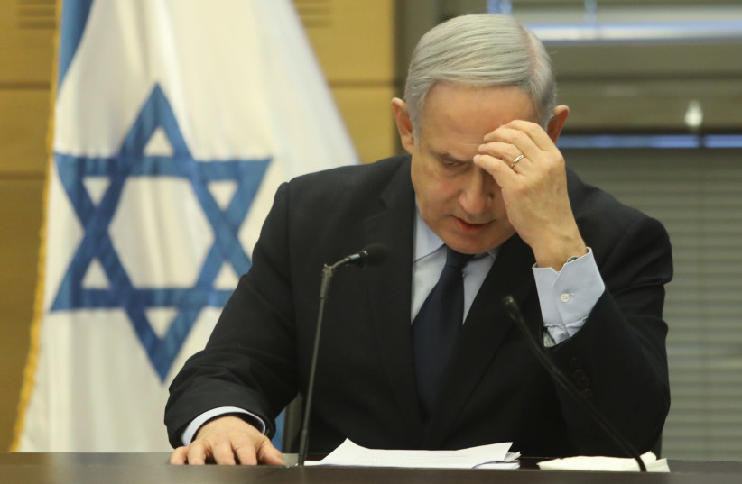 Prime Minister Benjamin Netanyahu speaking at the Knesset, February 2020. (photo credit: MARC ISRAEL SELLEM)