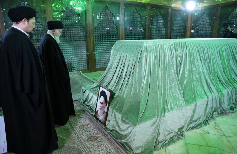 Iran's Supreme Leader Ayatollah Ali Khamenei visits the grave of Imam Iran's late founder of Islamic Revolution Ayatollah Ruhollah Khomeini, on the occasion of the anniversary of Khoemeini's return to Iran, in Tehran, Iran February 1, 2020 (photo credit: OFFICIAL KHAMENEI WEBSITE/HANDOUT VIA REUTERS)