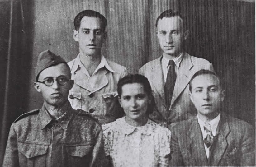 Menachem Begin in December 1942 wearing the Polish Army uniform of Gen. Anders’ forces with his wife Aliza and David Yutan; (back row) Moshe Stein and Israel Epstein (photo credit: JABOTINSKY ARCHIVES)