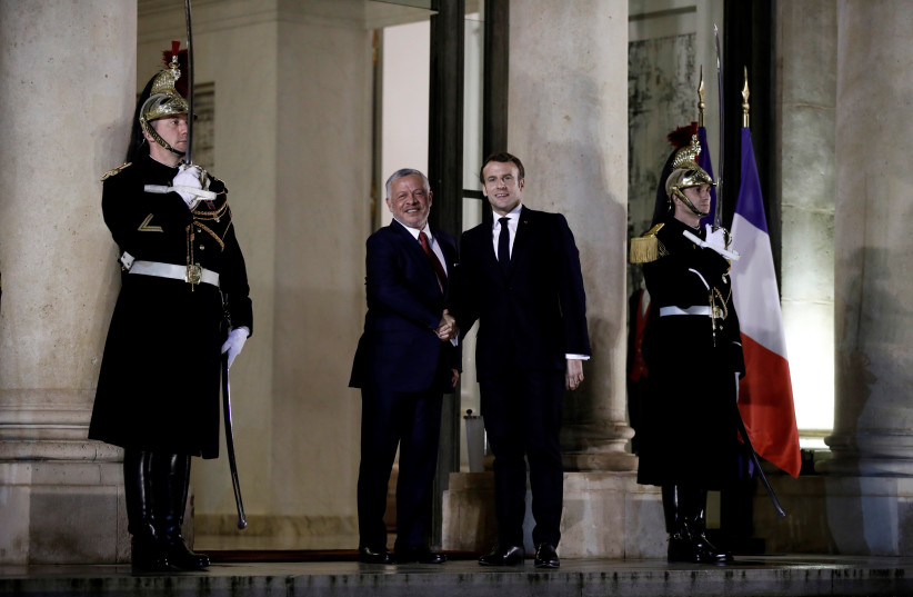 French President Emmanuel Macron welcomes the King of Jordan Abdullah II at the Elysée Palace on January 15 (photo credit: REUTERS)