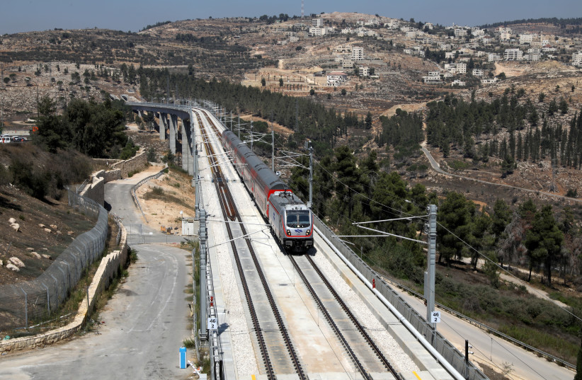Israel's new high-speed rail line travels on its tracks near Jerusalem September 25, 2018 (photo credit: AMMAR AWAD/REUTERS)