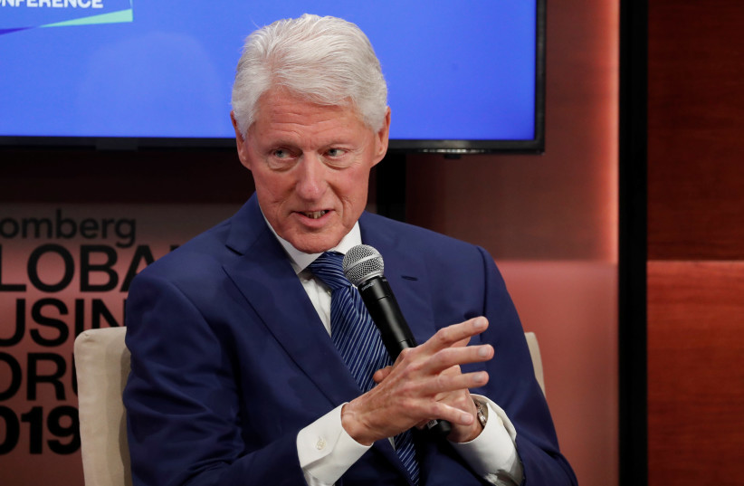 Former U.S. President Bill Clinton speaks during the Bloomberg Global Business Forum in New York City, New York, U.S., September 25, 2019 (photo credit: REUTERS/SHANNON STAPLETON)
