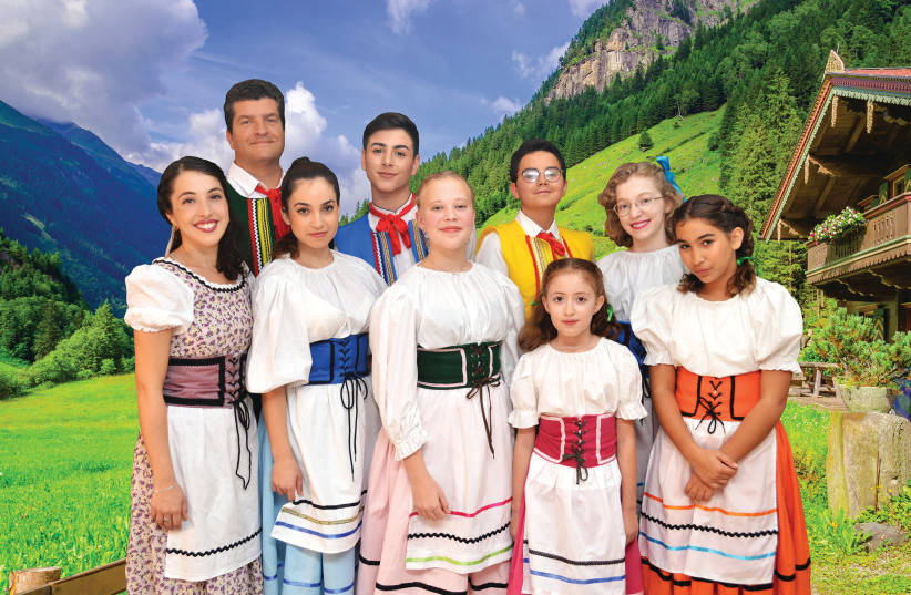 Michael Herman (back left) is Captain Von Trapp, and Netta Druckman (front left) plays Maria with the Von Trapp children in LOGON’S ‘The Sound of Music.’ (photo credit: Courtesy)