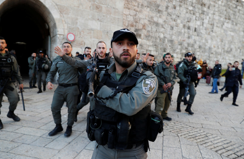 Israeli security forces are seen during protest against the U.S. president Donald Trump's Middle East peace plan, in Jerusalem's Old City January 29, 2020 (photo credit: AMMAR AWAD / REUTERS)