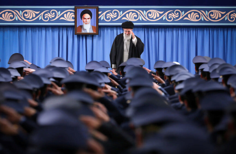 Iran's Supreme Leader Ayatollah Ali Khamenei gestures as he meets a group of Iranian Air Force officers in Tehran (photo credit: REUTERS)