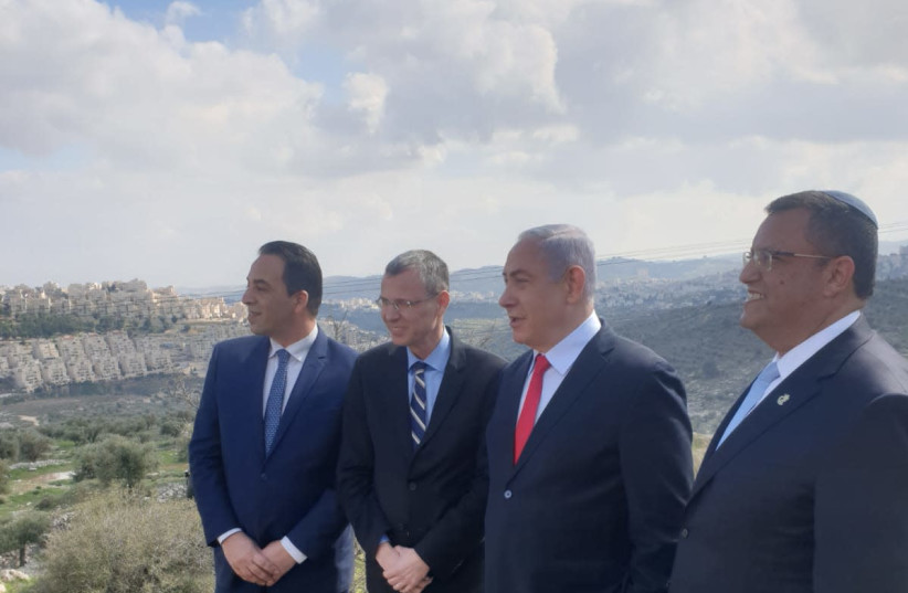 PM Benjamin Netanyahu and Jerusalem Mayor Moshe Lion announce new housing units in Har Homa (photo credit: AMOS BEN-GERSHOM/GPO)