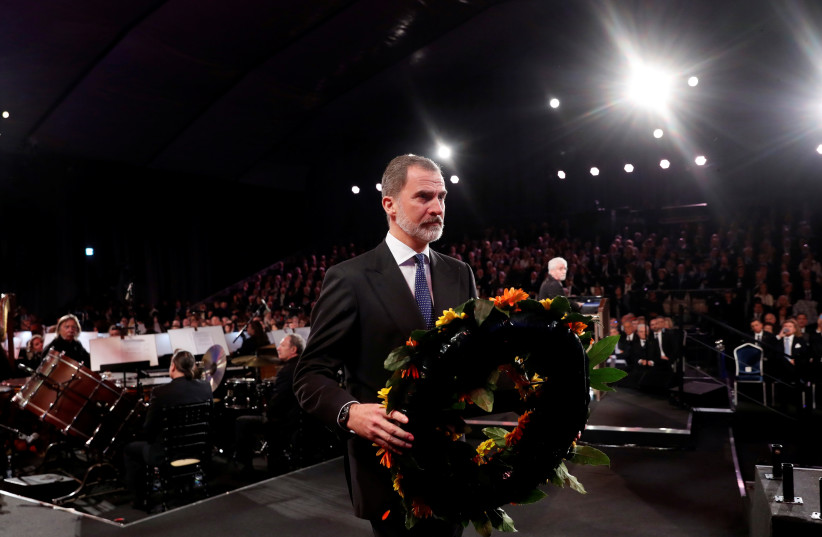 Spain's King Felipe VI takes part in a wreath-laying ceremony at the World Holocaust Forum marking 75 years since the liberation of the Nazi extermination camp Auschwitz, at Yad Vashem Holocaust memorial centre in Jerusalem January 23, 2020. (photo credit: REUTERS)
