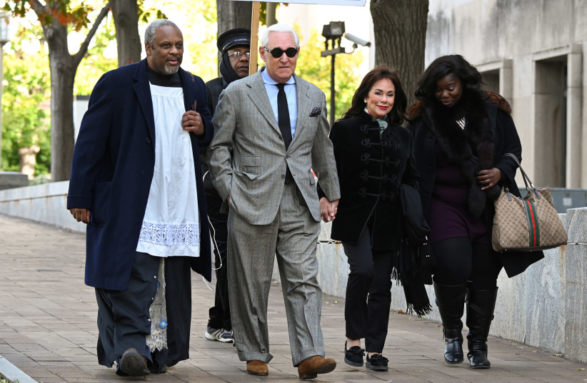 Former Trump campaign adviser Roger Stone, joined by his wife Nydia Stone and other witnesses, arrives for his criminal trial on charges of lying to Congress, obstructing official proceeding and witness tampering at the U.S. District court in Washington, U.S. November 14, 2019 (photo credit: REUTERS)