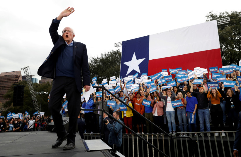 Democratic U.S. presidential candidate Senator Bernie Sanders takes the stage for an outdoor campaign rally in Austin, Texas, U.S., February 23, 2020. (photo credit: REUTERS/MIKE SEGAR)