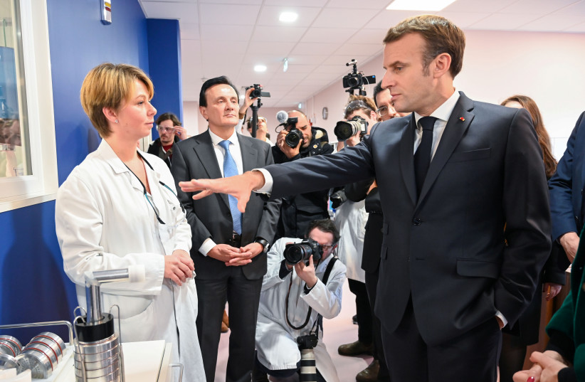 French President Emmanuel Macron visits AstraZeneca factory in Dunkirk (photo credit: REUTERS)