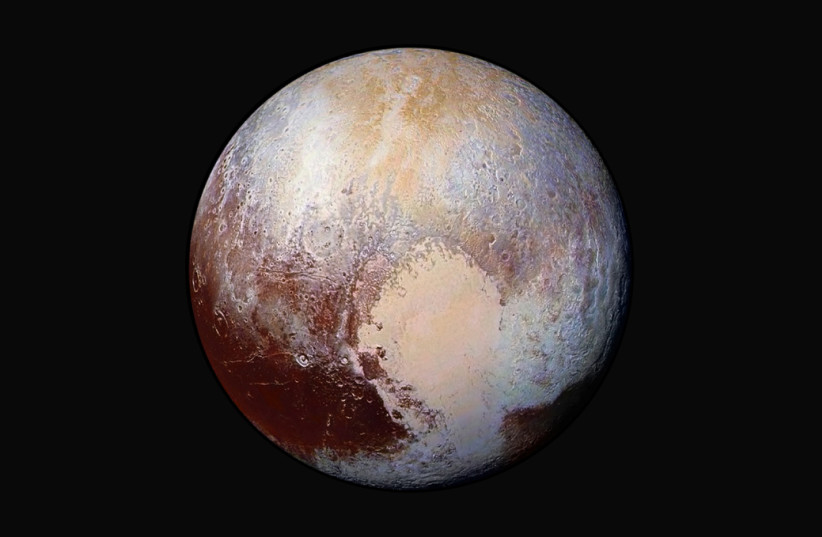 An image of Pluto captured by the New Horizons spacecraft in 2015 (photo credit: NASA)