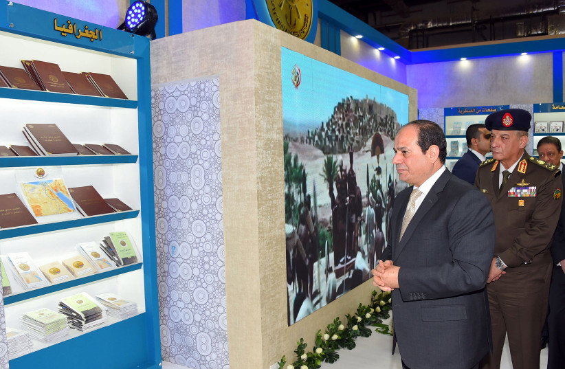 Egypt's President Abdel Fattah al-Sisi (L) attends the opening ceremony of the 50th Cairo International Book Fair in Cairo, Egypt, January 22, 2019, (photo credit: COURTESY OF THE EGYPTIAN PRESIDENCY)