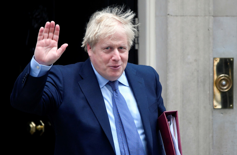 Britain's Prime Minister Boris Johnson waves as he leaves Downing Street in London, Britain, February 26, 2020 (credit: REUTERS/TOBY MELVILLE)