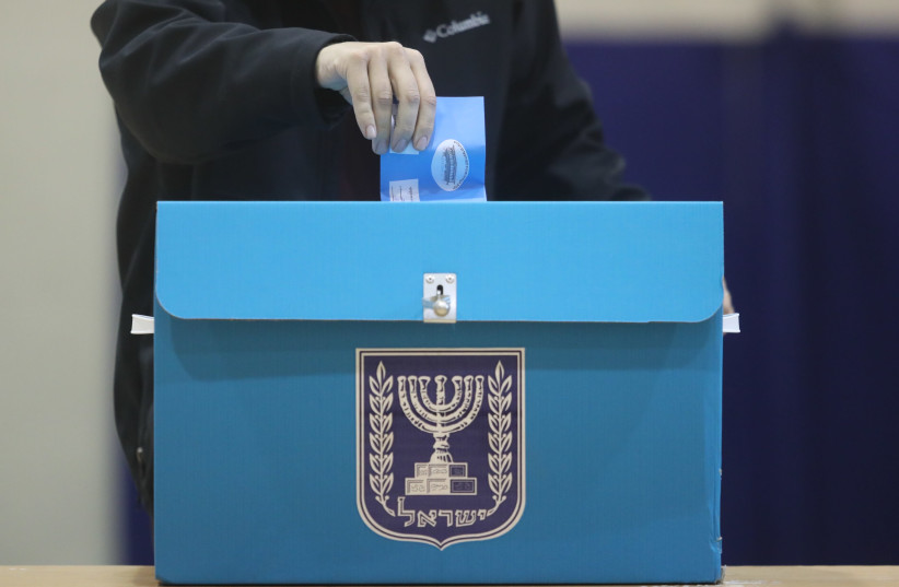 People vote in Jerusalem on election day, March 2, 2020. (photo credit: MARC ISRAEL SELLEM)