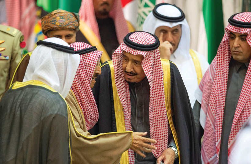 SAUDI ARABIA’S King Salman bin Abdulaziz Al Saud talks with Kuwaiti Emir Sheikh Sabah al-Ahmad al-Jaber al-Sabah during the Gulf Cooperation Council’s (GCC) 40th Summit in Riyadh, in December. (photo credit: REUTERS)