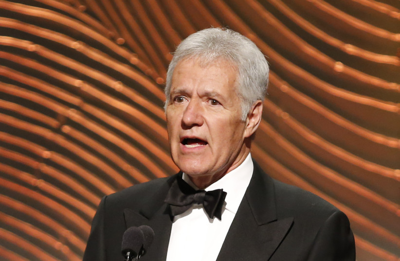 Jeopardy television game show host Alex Trebek speaks on stage during the 40th annual Daytime Emmy Awards in Beverly Hills, California June 16, 2013. (photo credit: DANNY MOLOSHOK/ REUTERS)