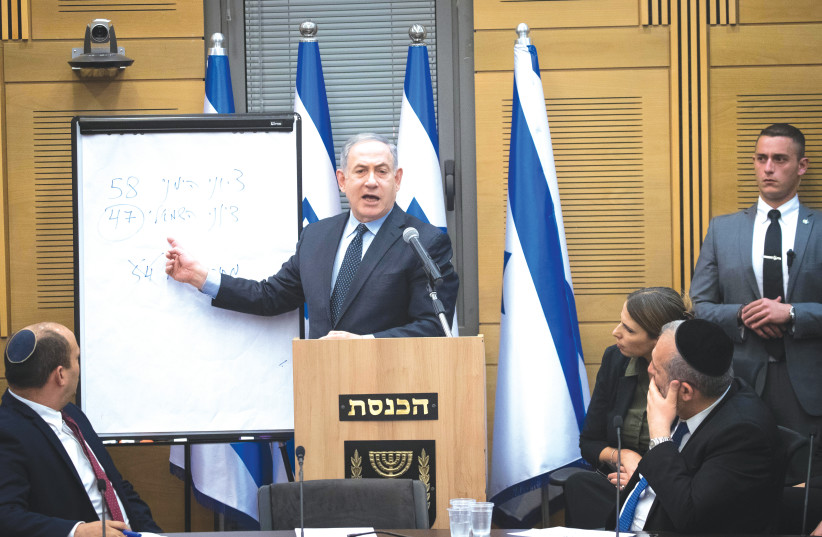 PRIME MINISTER Benjamin Netanyahu meets with representatives from his 58-member right-wing bloc at the Knesset on Wednesday. (photo credit: YONATAN SINDEL/FLASH 90)